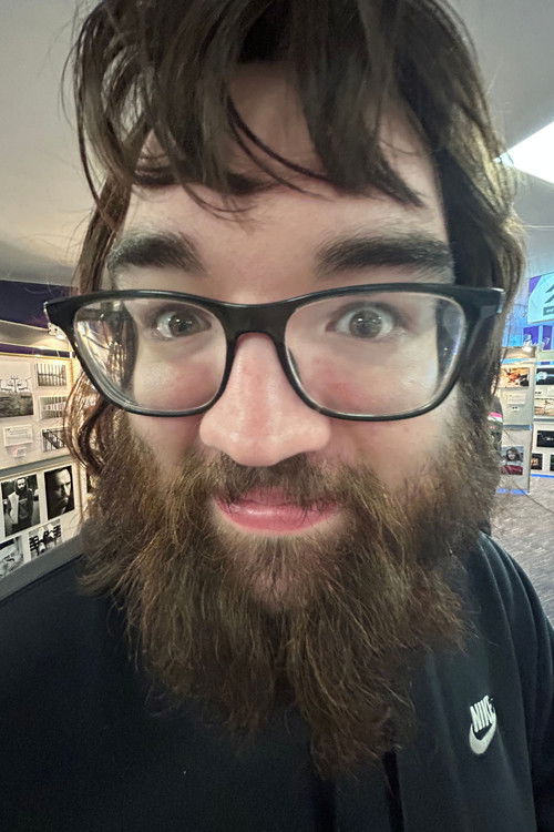 Liam Michie as Collection Staff