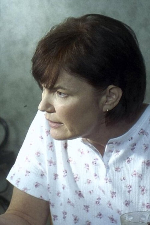 Monica Monica as Mrs. Crowley