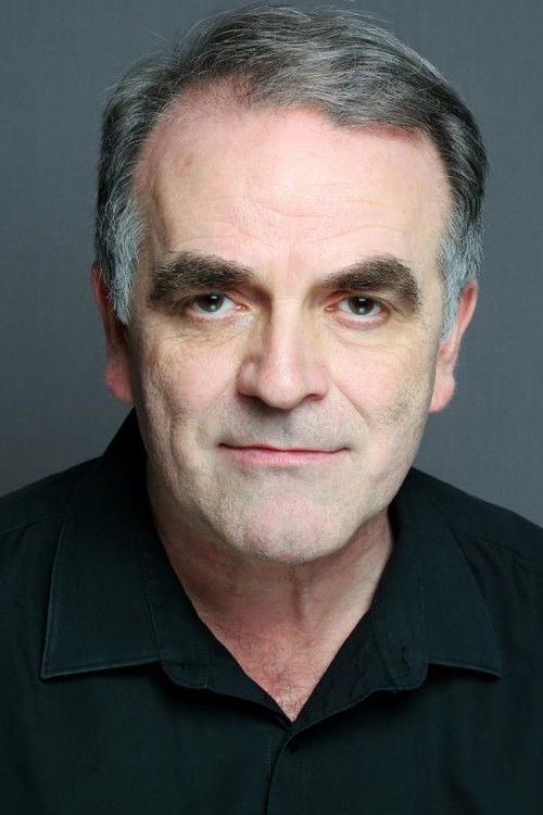 Andrew McDonald as Russell