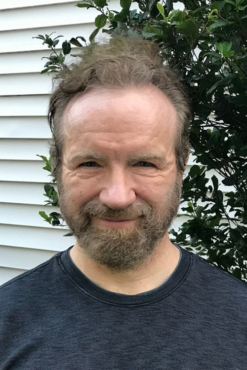 Doug Mancheski as The Merchant