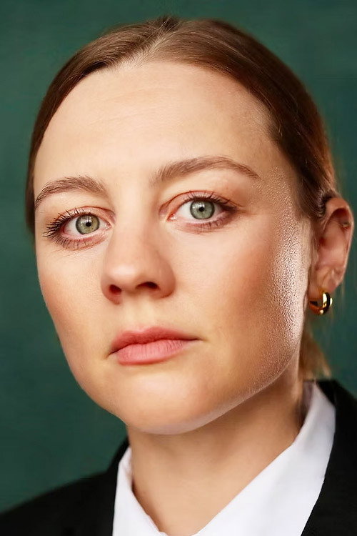 Imogen Wilde as Female Officer