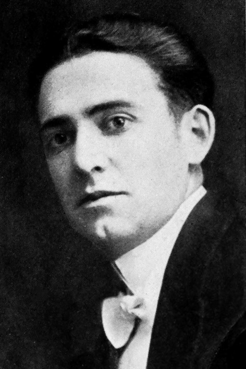 Barney Furey as Tom - the Hotel Clerk