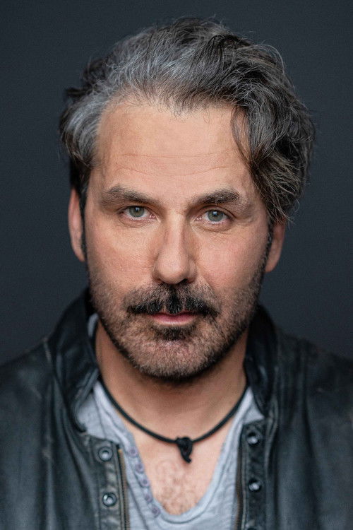 Michael Kelly as Jim Larochelle