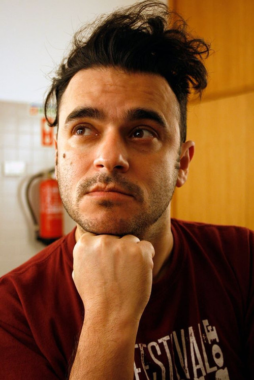 Pedro Tochas as the gas station employee