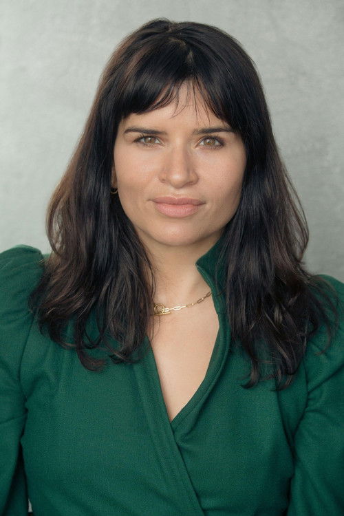 Salima Saxton as Special Registrar