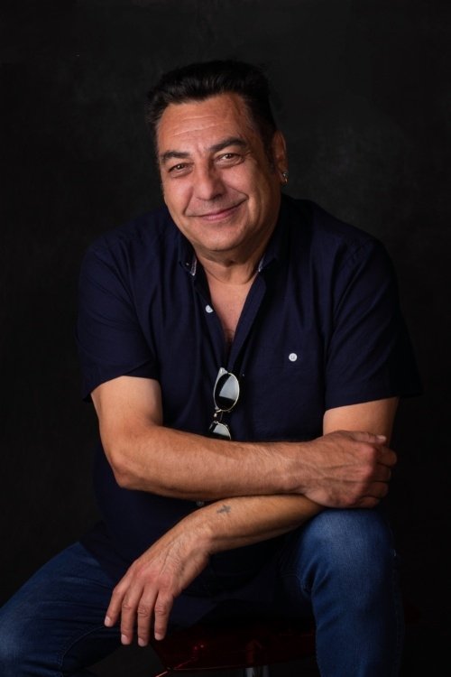 Norman Hassan as Himself