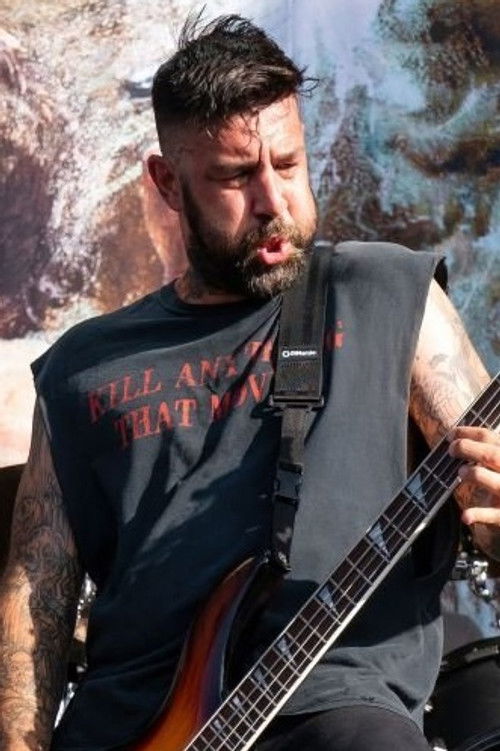 Chris Beattie as Bass