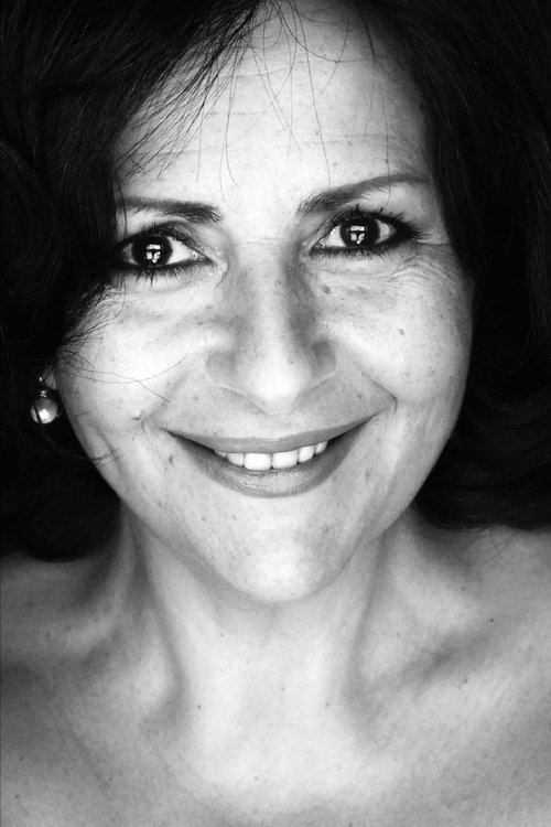 Vitalba Andrea as Carmela