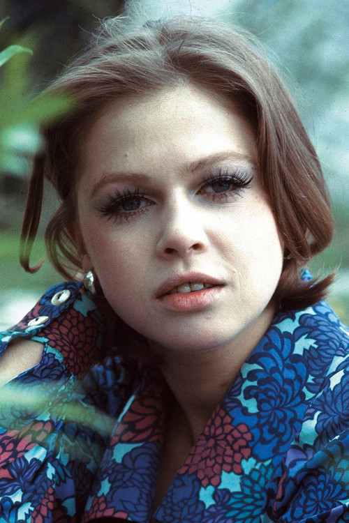 Helga Anders as Leslie Pouliard