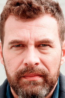 Fred Tatien as Padre de Roci