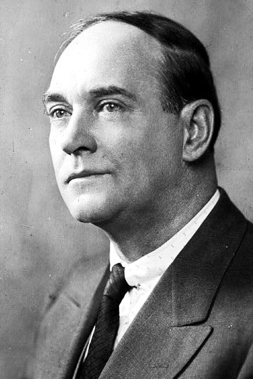 Hugh Cameron as Photographer