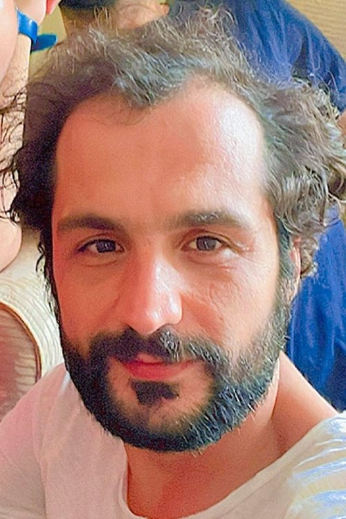 Sajad Hamidian as The Agent