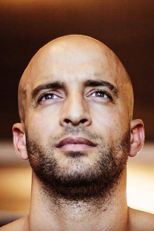 Walid Benmbarek as Reza