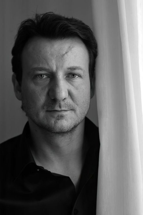 Robert Więckiewicz as Janusz