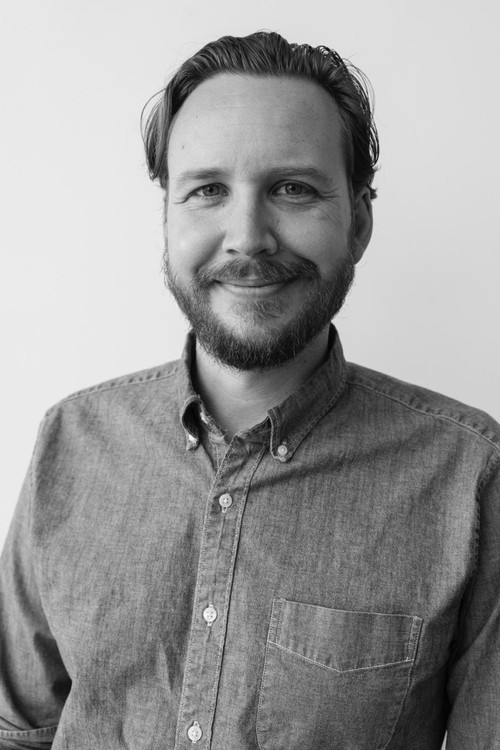 Adam Hendricks as Newscaster