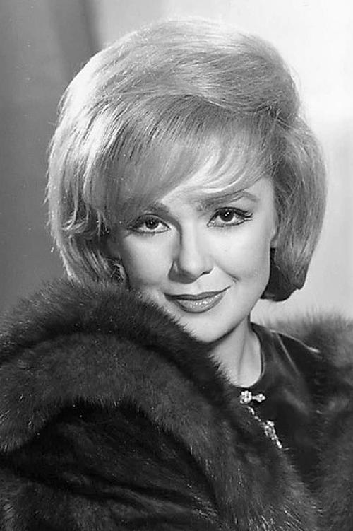 Edie Adams as Miss Olsen