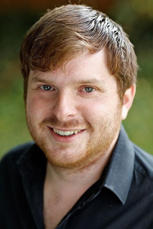Michael Watson-Gray as Tom (1st Assistant Director)