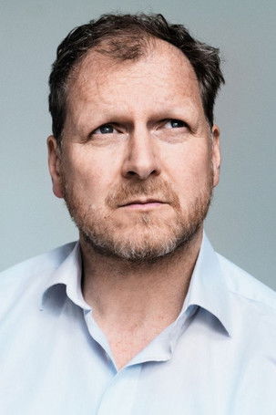 Guido Renner as Buchhändler