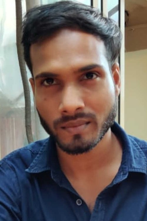 Nehpal Gautam as Umesh Yadav (Security Guard)