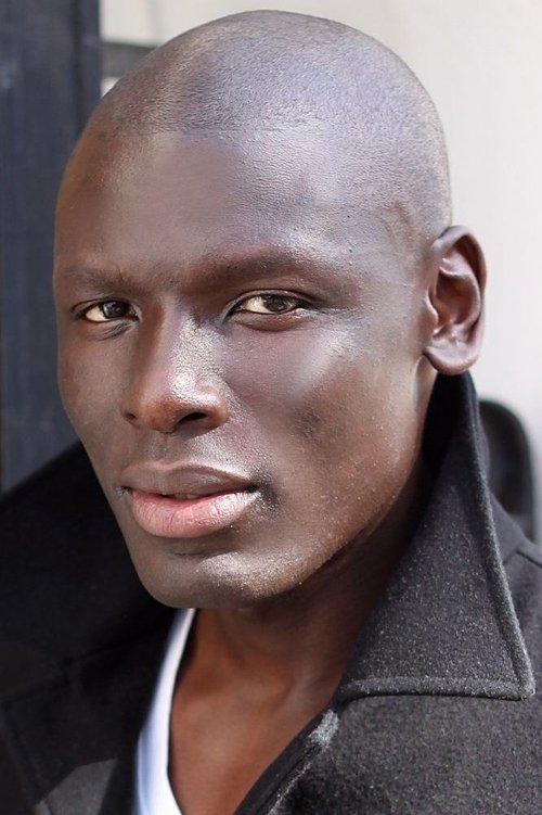 Robert Okumu as 