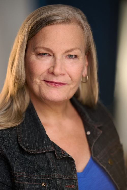 Valerie Planche as Bank Clerk