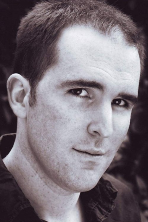 Gareth Tunley as The Priest