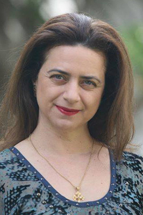 Elena Papadopoulou as Suzie Karakamilou