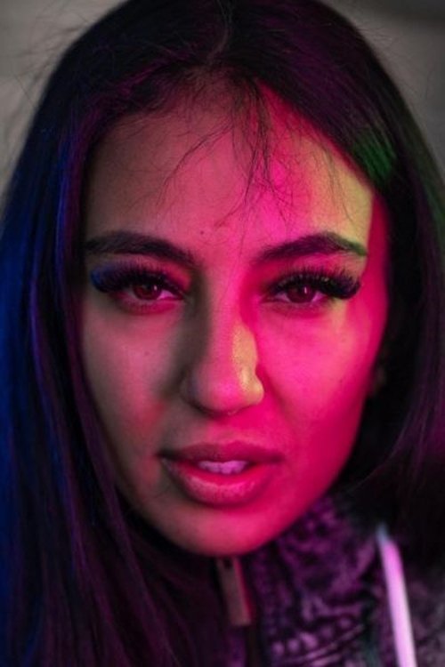 Liz as Self - Rapper