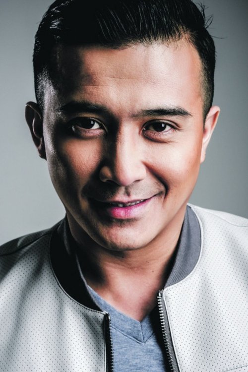 Aaron Aziz as 