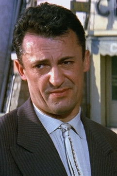 Jack Ary as Inspector Brevan