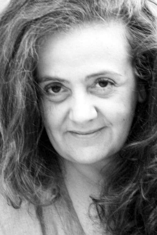 Alicia Muxo as Woman #1