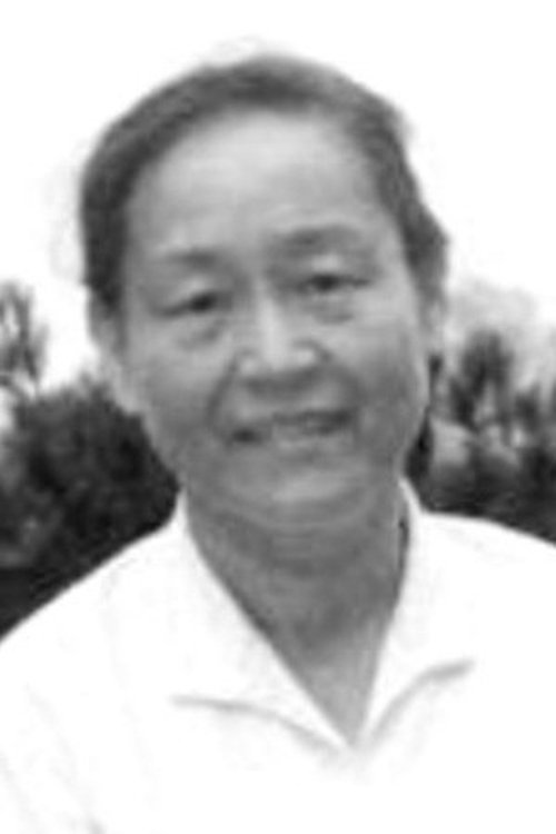 Qingfen Zhang as Yong-Gui's wife