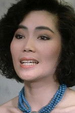 Ann Mui Oi-Fong as Ah Chiao's wife