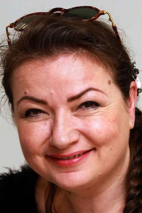 Lucy Harrison as Hostess