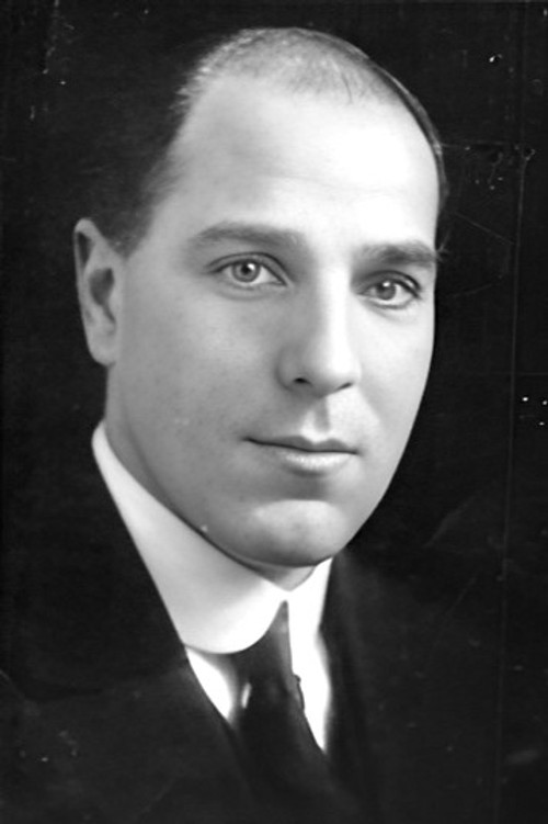 Robert Atkins as The Vicar