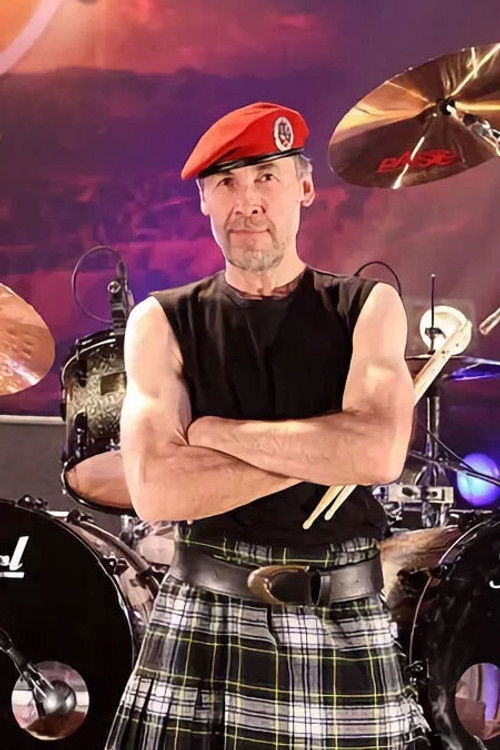 C.C. Behrens as Drums