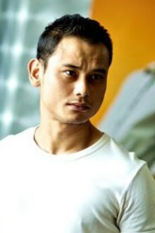 Aidil Aziz as Koperal Micheal Riman Anak Bugat