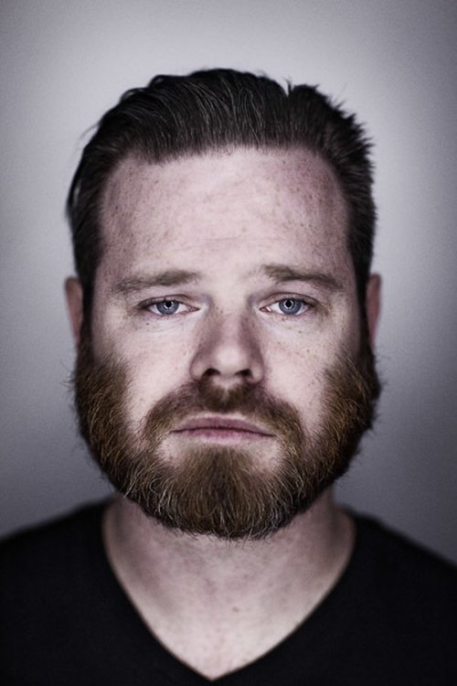 Paul Snodgrass as Reporter