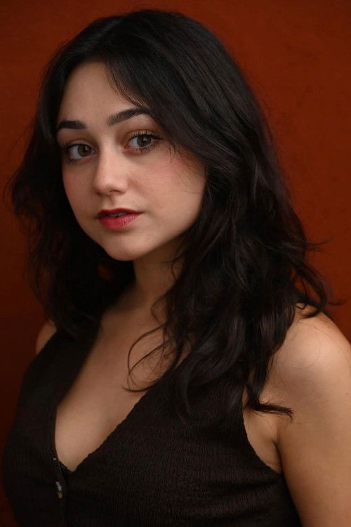 Gaia Maria Tini as The Witness