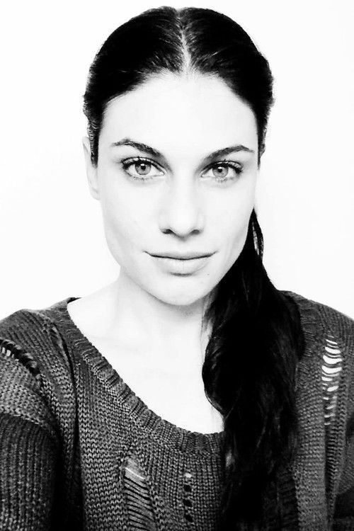 Bernadette Couture as Refugee Wife