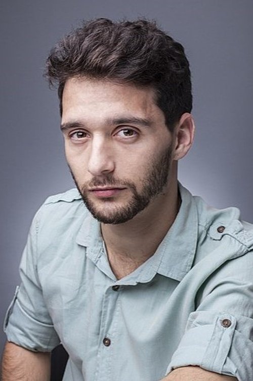 Alon Sandler as רועי