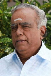 Pyramid Natarajan as Sandhya's Father