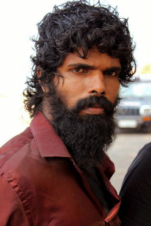 Bineesh Bastin as Chetan's henchman