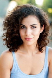 Andrea Sixtos as June