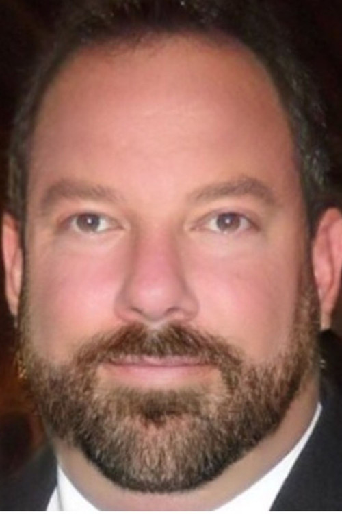 Marc Mouton as Marc Benson