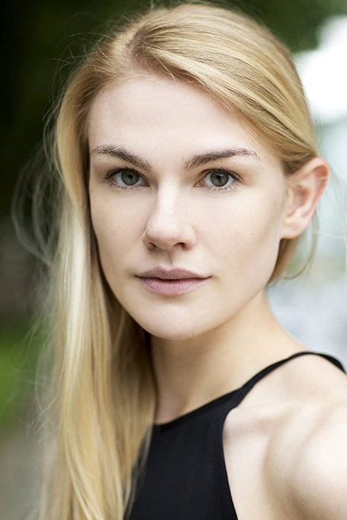 Eleanor Williams as Aiken's Assistant