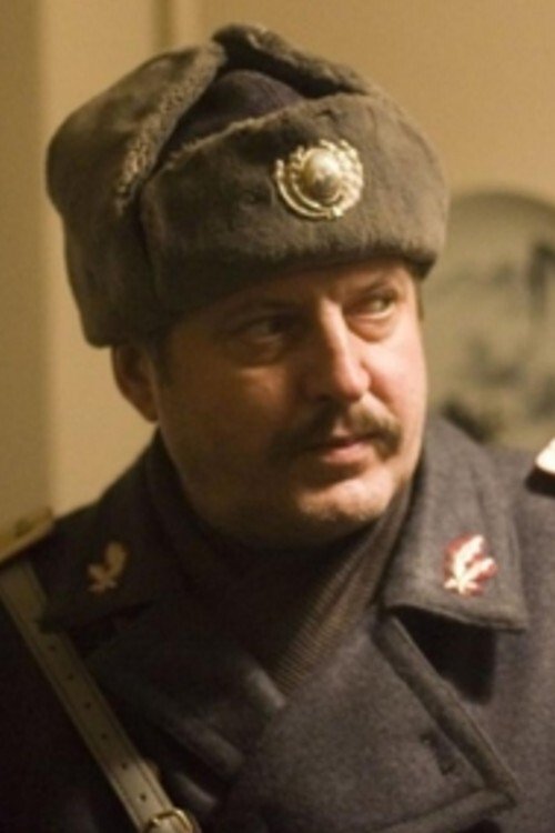 Adi Cărăuleanu as Father Dragoș