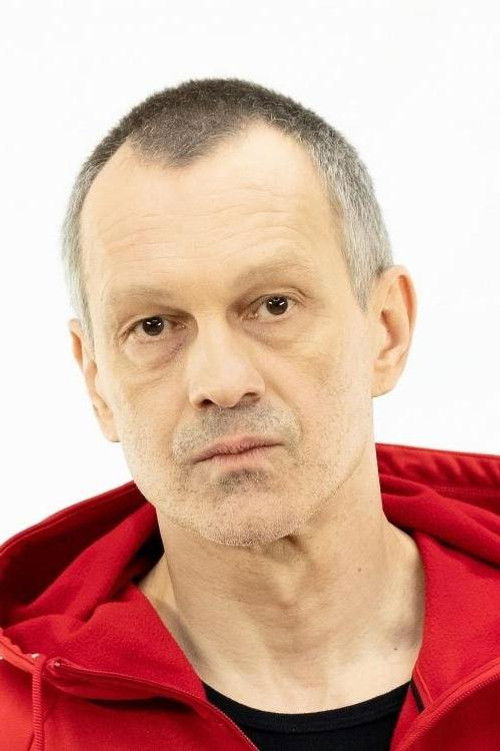 Przemysław Kozłowski as Priest