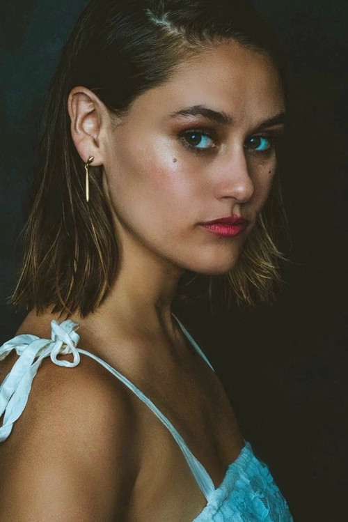 Caity Brewer as Marcia