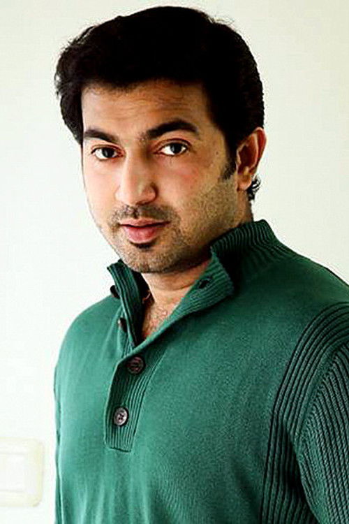 John Jacob as Anoos Mohan